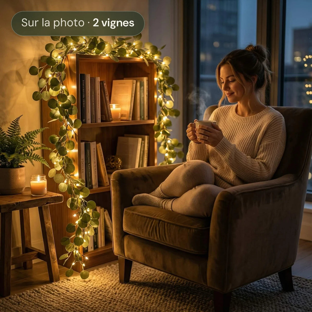 Vigne de Lumière guirlande d'eucalyptus lumineuse près d'un fauteuil, le soir | Jardin de Mamie